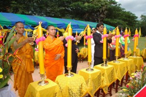 Religious leaders light peace candle.