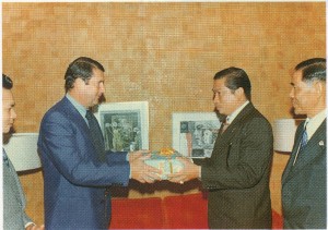 Page 21 H.E. J.C. Oberg, Swedish Ambassador, presenting Holy Soils to Dr. Suchart Kosolkitiwong, President of I.F.R.
