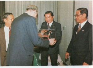 Page61 Dr. Suchart Kosolkitiwong presenting a symbol for peace co-operation to Mr. Jean Gaudemet, Counsellor for the Religious Affairs, Ministry for Foreign Affairs, Paris, France.